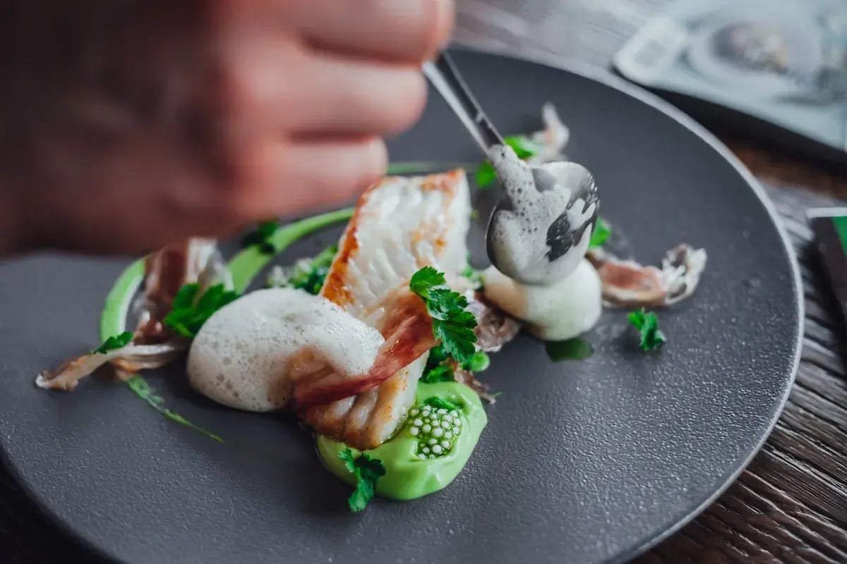 Fish food on plate in michelin star restaurant